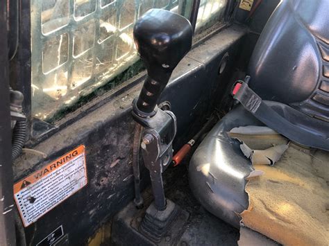 new holland ls180 skid steer hand controls|ls180 new holland specifications.